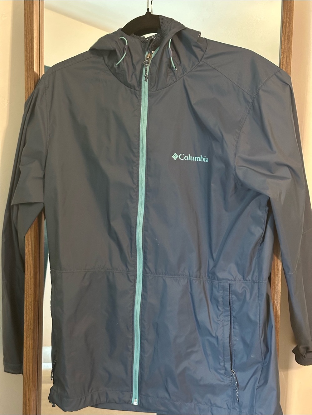 Columbia Blue Windbreaker with Teal Zipper